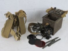 A WWII tin with British Mk2 Morse code signalling lamp projector,
