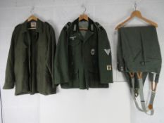 Repro uniform; a German combat Jacket with insignia,