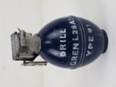 An inert British L28A1 drill grenade with L30A2 fuse assembly.