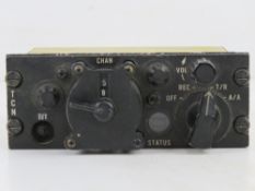 A Harrier aircraft cockpit control TACAN unit.