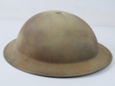 A WWII British Army Brodie MkII helmet.