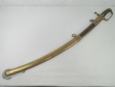 A Brass Cavalry sabre and scabbard.