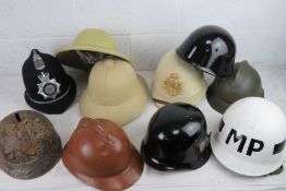 Ten assorted helmets.