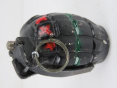 An inert No.36 Mills grenade.