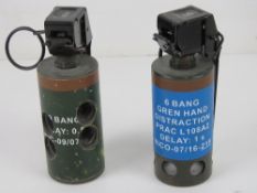Two inert flash bangs.