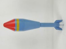 An inert NR5 Energa training rifle grenade (blue red and yellow) 36cm in length.