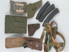 A flame thrower gunners kit, three inert PPS-43 magazines, a PPS-43 pouch and sling,