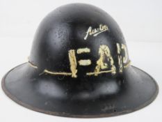 A WWII Austin factory first aid party helmet.