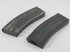 Two AK47 magazines each with single inert bullet within.