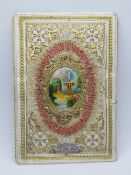 A perfumed sachet valentine card having central lake scene with fountain and swan and the message