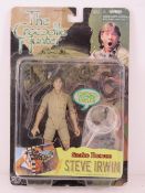 The Crocodile Hunter, Steve Urwin figurine with accessories in original box 'Crikey I Talk'.