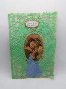 A decoupage Sweetheart or Valentines card, having green paperlace with central portrait,