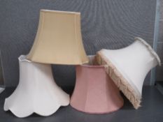 Four assorted large lamp shades, 52cm, 47cm, 55cm and 51cm wide respectively.