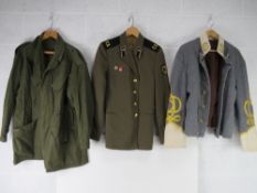 A Dutch combat jacket, a USSR tunic with