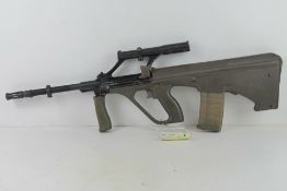 A deactivated Steyr Aug. SN M17752.