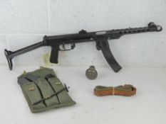A deactivated PPS43, with 3 spare mags,