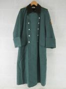 A reproduction WWII German Great Coat.