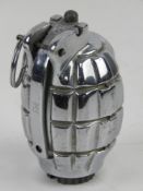 An inert chromed No.36 Mills Grenade.