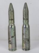 Two inert US M5 1A2 20mm drill rounds, e