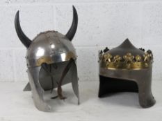 Two Medieval style re-enactors helmets.