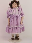 A handmade 20th century bisque headed do