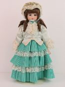 A handmade 20th century bisque headed do