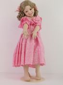 A handmade 20th century bisque headed do