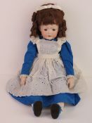 A handmade 20th century bisque headed do