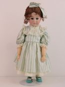 A handmade 20th century bisque headed do