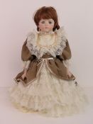 A handmade 20th century bisque headed do