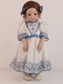 A handmade 20th century bisque headed do