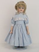 A handmade 20th century bisque headed do