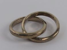 A Russian style silver interlocked ring set, stamped 925, size O-P.