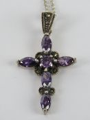 A Gothic silver crucifix set with purple stones and marcasites, 4.