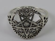 A silver Wiccan pentagram and tree of life design ring, stamped 925, size T.