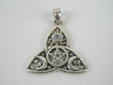 A silver Wiccan pentagram, crescent and moonstone pendant, stamped 925 and measuring 2.7cm wide.