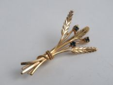 A yellow metal brooch, indistinct mark possibly 9c?,