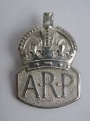 A HM silver ARP label badge, London hallmark.