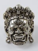 An Asian Death God ring having skull crown, stamped 925, size T (slightly adjustable) 20.7g.