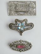 Three vintage silver brooches; a 930 silver continental enamelled brooch,