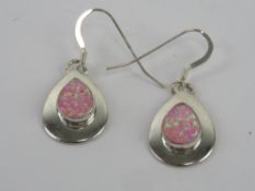 A pair of silver and pink opal earring, teardrop shaped and stamped ster., in presentation box.