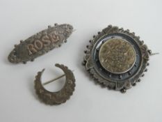 Three late Victorian / early 20th century Sweetheart brooches, two having silver hallmarks upon.