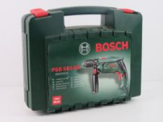 A Bosch PSB 550 RE drill in case.