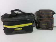 A Stanley tool bag together with a leather tool belt.