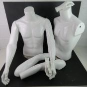 Two male mannequins with removable arms and hands.