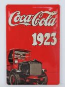 A contemporary Coca-Cola sign.