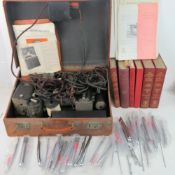 A quantity of medical equipment including Cardiogram? in leather case and medical books.