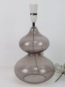 A retro 1960's style glass table lamp.