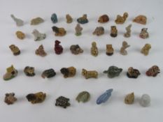 A quantity of Wade Whimsies including dinosaur, Little Red Riding Hood,