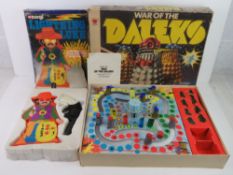 Two vintage games 'Lightning Luke' and 'War of the Daleks'.